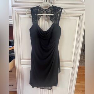 Little black dress. No tags but size 12. Stretch nylon fabric